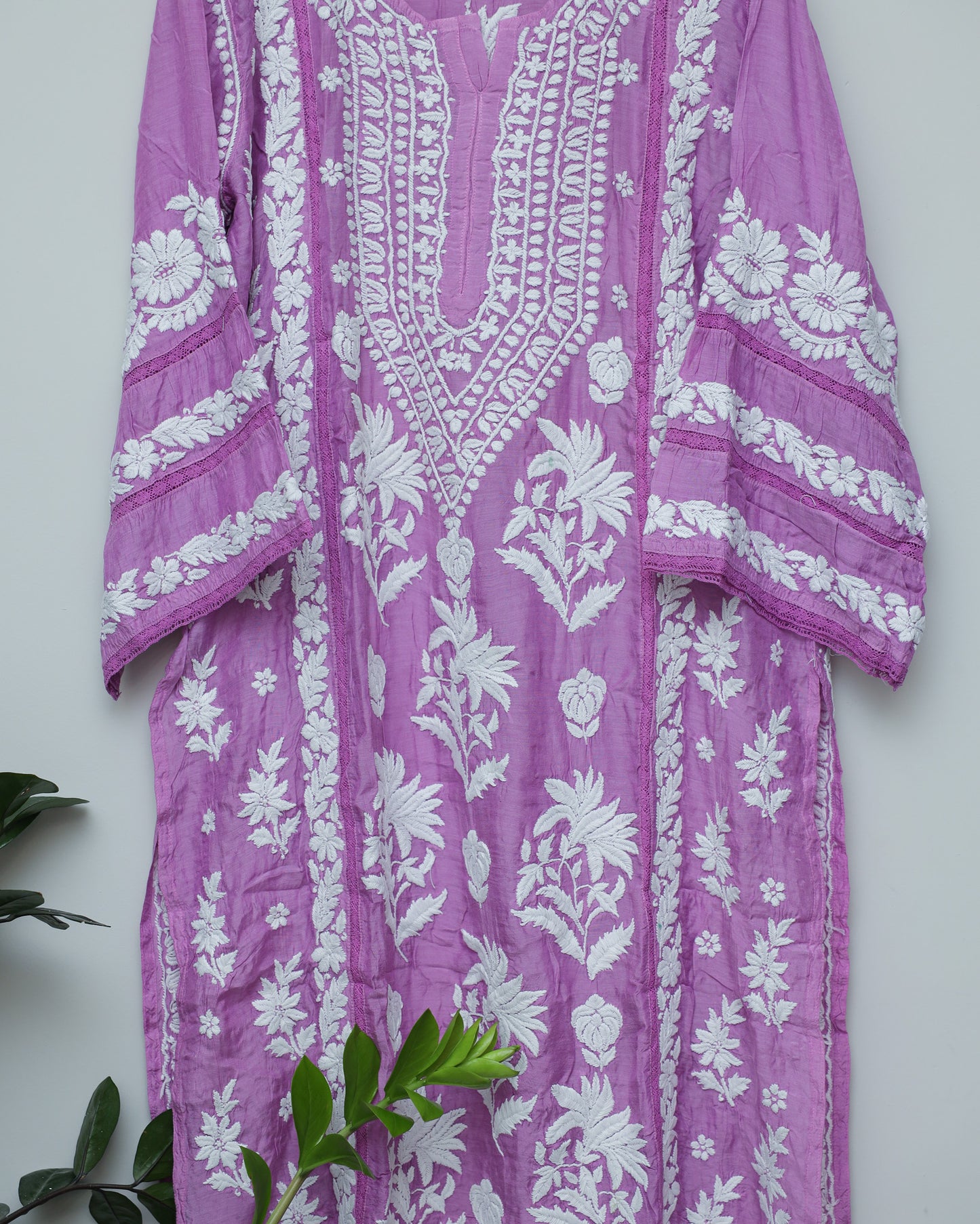 Bright purple with white threadwork