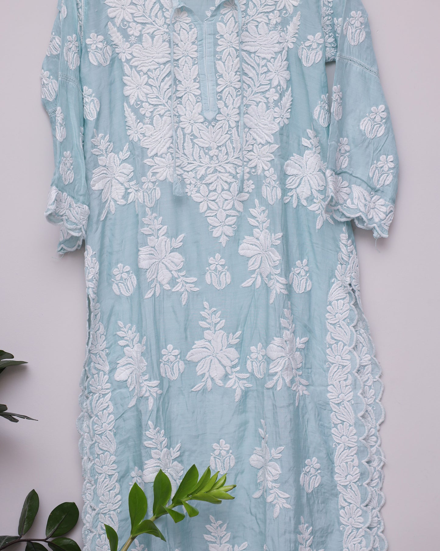 Cool Green silk chikankari handwork kurti with curves with the borders across the flow